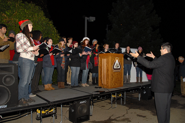 German Aguilar directs the Delta Singers.