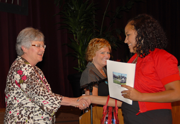 Dr. Kathy Hart and Denise Donn Greet an Award Recipient