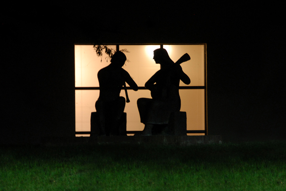 Irving Goleman Library-Musician Statue at Night Silhouette