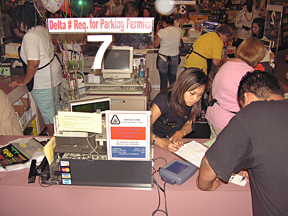 Students Purchase Parking Permits at the Delta Bookstore