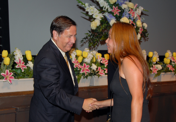 Dr. Jeff Marsee greets a scholarship award recipient.