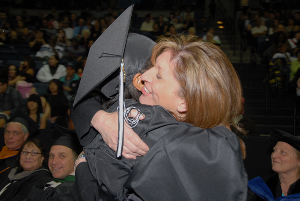 Teacher Hugs Student