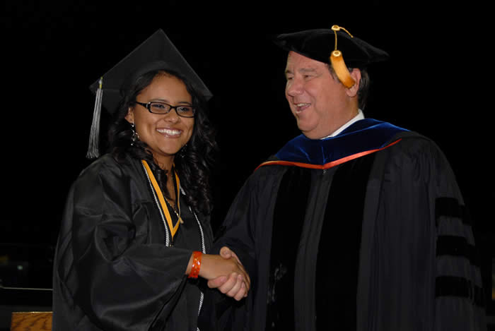 Dr. Jeff Marsee congratulates a 2011 grad.