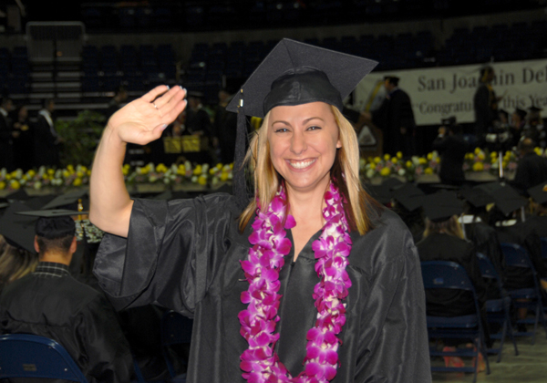 Waving Student Grad