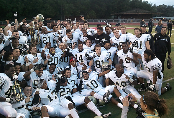 Delta's Mustangs Football Team celebrates their 63-56 victory over DeAnza in the Silicon Valley Bowl.