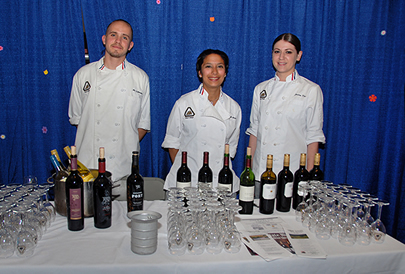 Culinary Mixer-Delta students serve an assortment of wines.