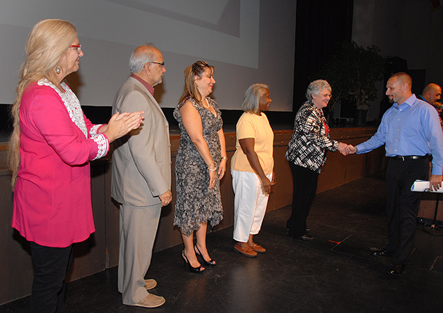 Dr. Kathy Hart leads the reception line at this year's event.