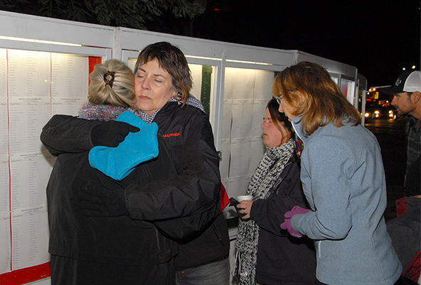 Hospice Donors find a loved ones name on the marquee.