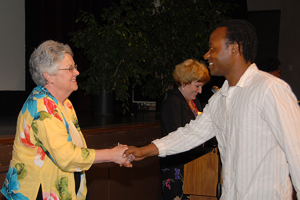 Superintenedent/President Dr. Kathy Hart greets a scholarship award winner at last year's ceremony.