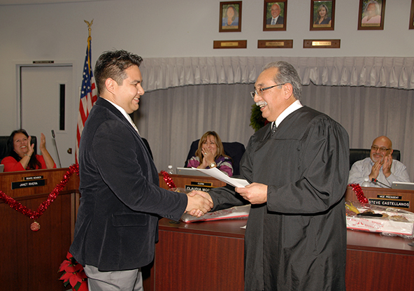 Richard Vasquez is congratualted by Judge Jose L. Alva