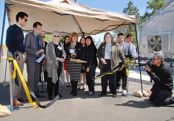 Delta College Dedicates its New Horticulture Center - Dr. Kathy Hart cuts the ribbon.