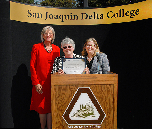 (L-R) Lorinda Forrest, Dr. Kathy Hart and  Amy Schultz display the signed pledge.