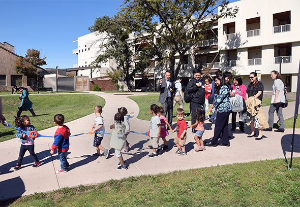 Phinnie Group greets Child Development Center children on their daily walk.