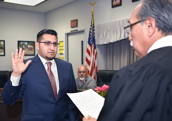 Carlos Huerta takes Oath of Office as Delta's newest trustee.