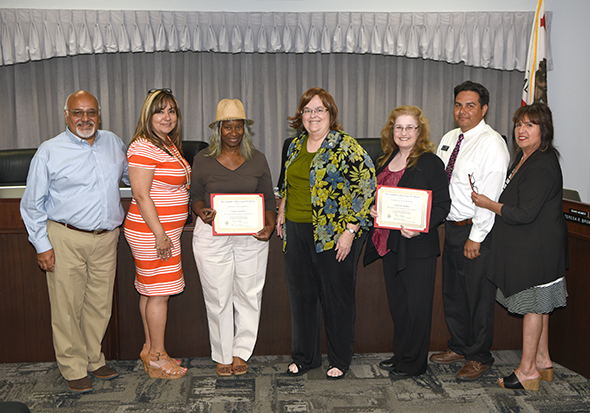 (L-R) Trustees Steve Castellanos, Claudia Moreno, Jennet Stebbins, Teresa Brown, Dr. Catherine Mathis, Richard Vasquez and Janet Rivera