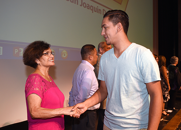 A Delta College Scholarship donor greets a recipient.