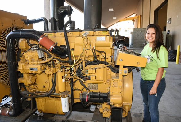 A young woman in the Caterpillar Program