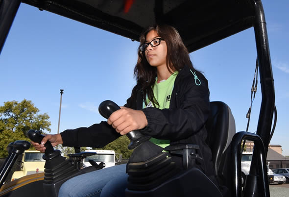 A young woman in the Caterpillar Program